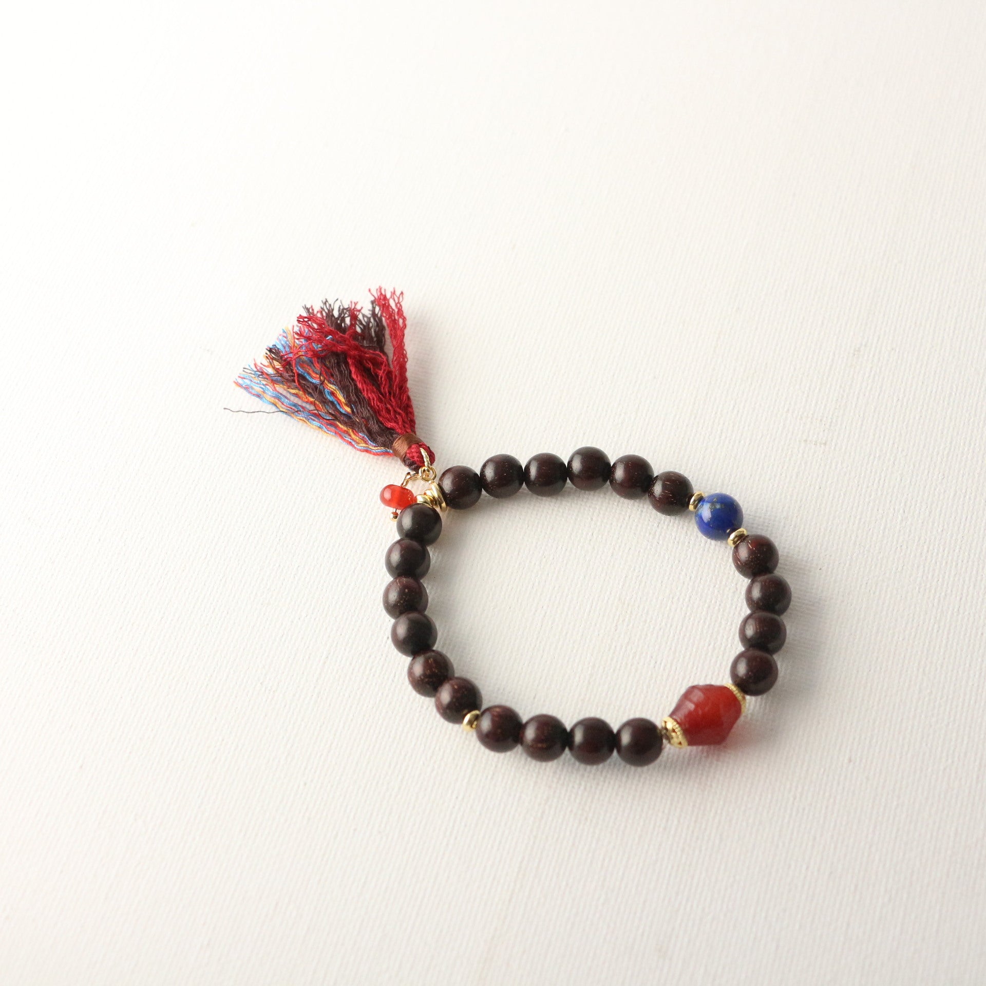 JEKIRA Black Gemstone & Ruby Tassel Bracelet