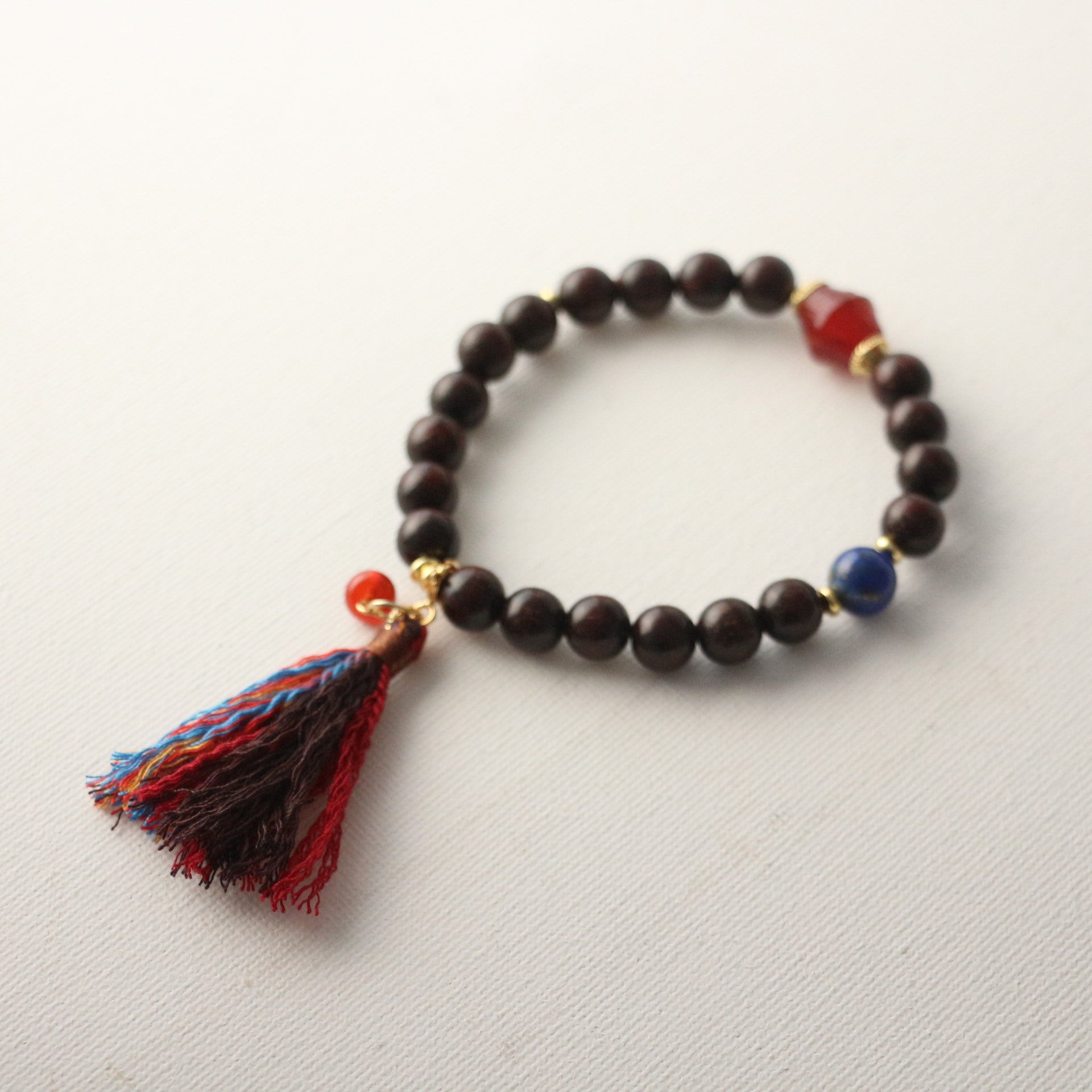 JEKIRA Black Gemstone & Ruby Tassel Bracelet