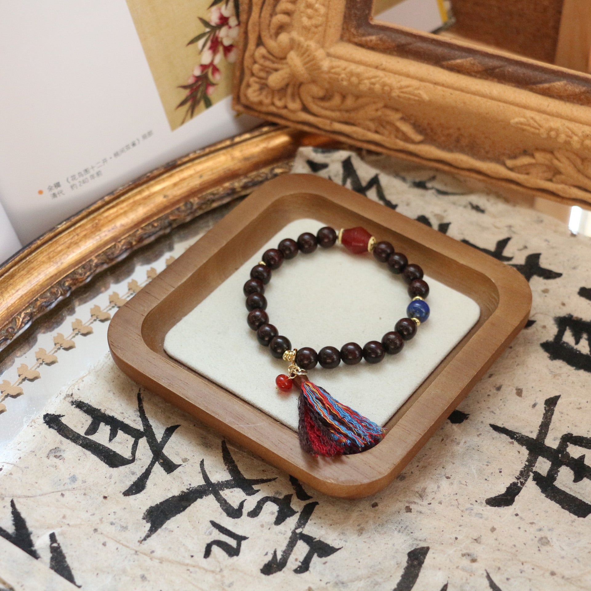 JEKIRA Black Gemstone & Ruby Tassel Bracelet