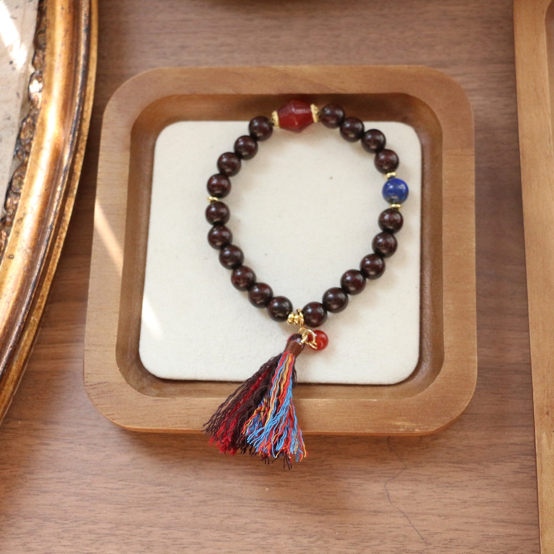 JEKIRA Black Gemstone & Ruby Tassel Bracelet